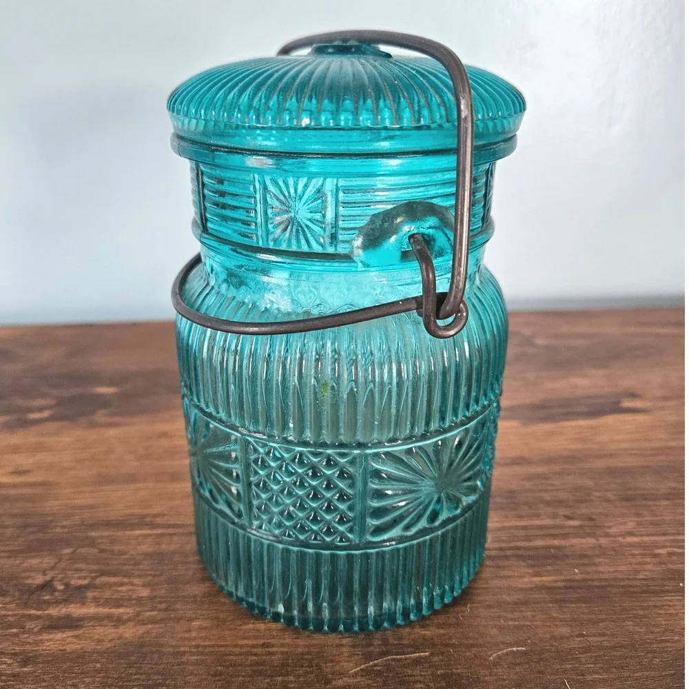 Vintage Avon Teal Blue Glass Jar Wire Bail Handle Sunburst Daisy Button Pattern